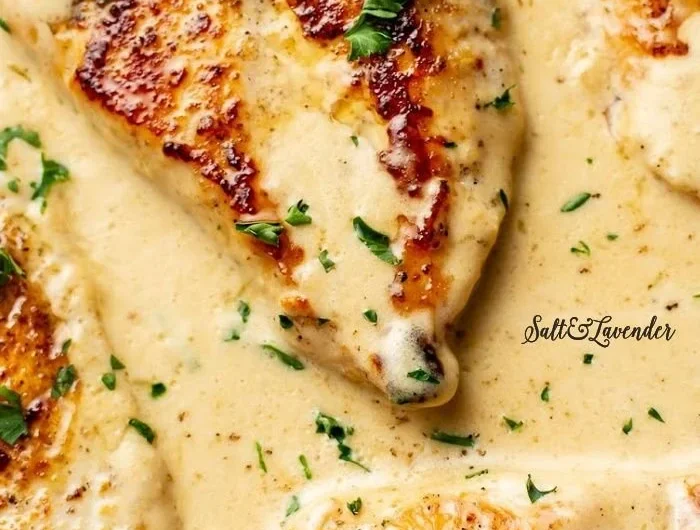 Creamy garlic parmesan chicken dish served in a skillet