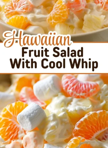Hawaiian fruit salad with Cool Whip served in a bowl topped with fresh fruit.