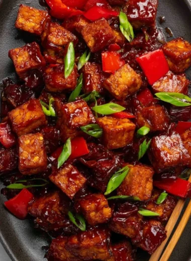 Delicious plate of Szechuan Tofu garnished with colorful vegetables