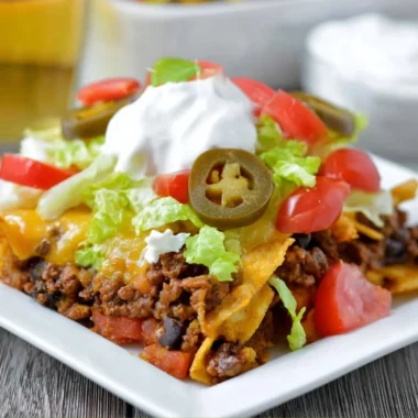 Delicious Walking Taco Casserole served in a bowl with toppings
