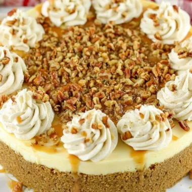 Delicious browned butter pecan cheesecake topped with crunchy pecans.