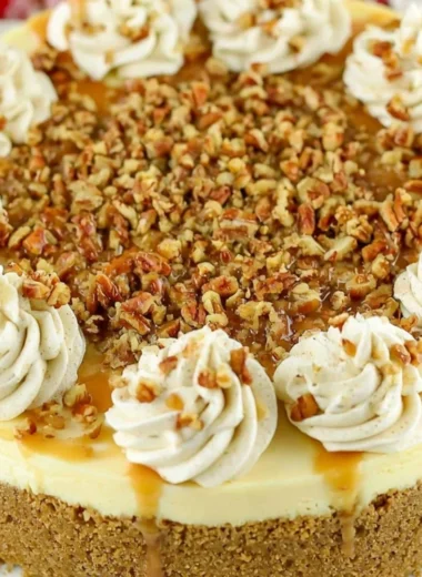 Delicious browned butter pecan cheesecake topped with crunchy pecans.