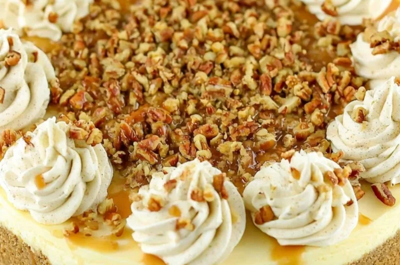 Delicious browned butter pecan cheesecake topped with crunchy pecans.