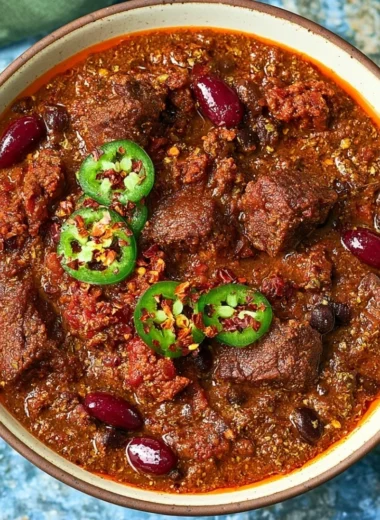 Delicious chili with beef short rib and chorizo served in a rustic bowl