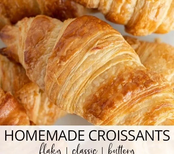 Homemade classic croissants fresh out of the oven, golden and flaky.