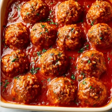 Delicious porcupine meatballs served with sauce and garnished