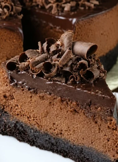 Delicious Triple Chocolate Cheesecake with a crunchy Oreo crust
