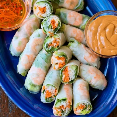 Plate of fresh Vietnamese spring rolls with dipping sauce