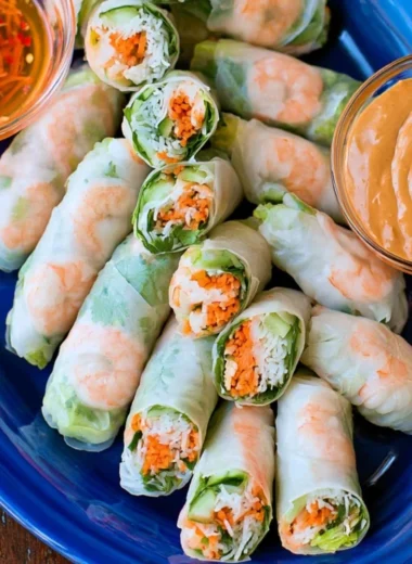 Plate of fresh Vietnamese spring rolls with dipping sauce