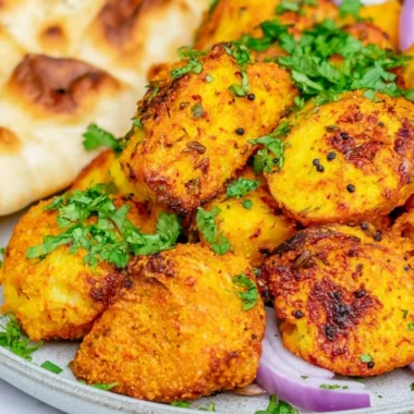Deliciously spiced authentic Bombay Potatoes served on a plate