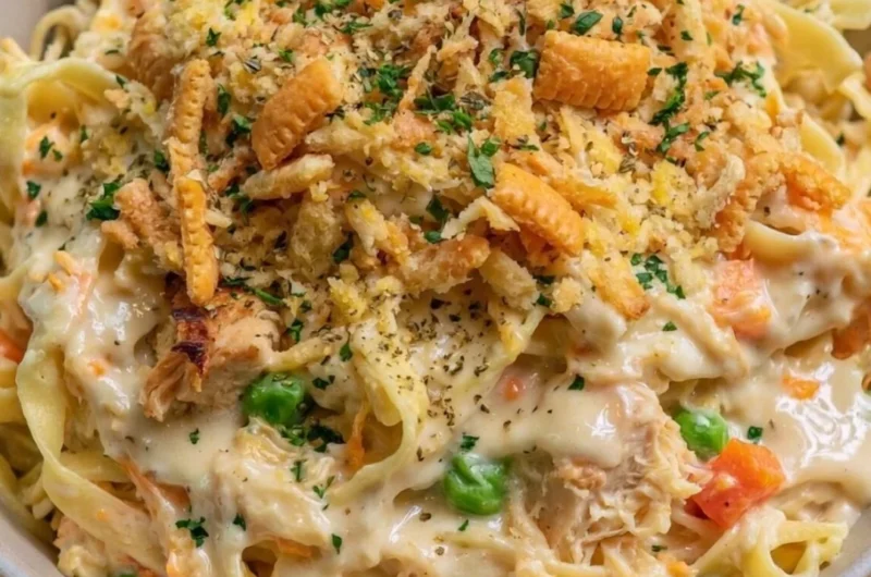 Chicken Noodle Casserole topped with cheese and baked to perfection