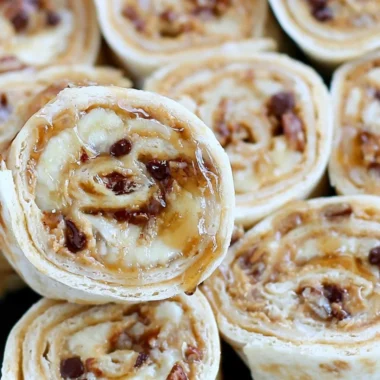 Chocolate Chip Peanut Butter Banana Roll Ups served on a plate