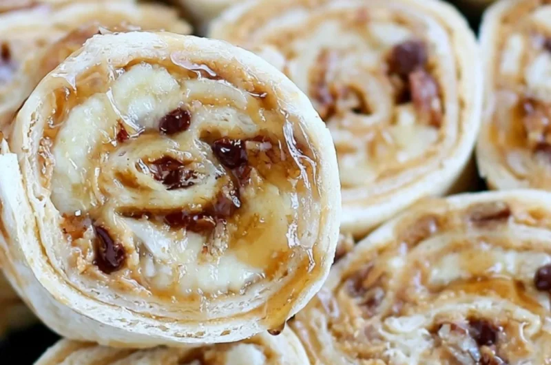 Chocolate Chip Peanut Butter Banana Roll Ups served on a plate