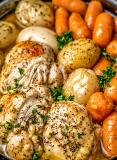 Crockpot garlic herb chicken with vegetables cooked for a comforting meal