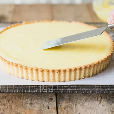 Delicious lemon tart with a golden crust and creamy lemon filling