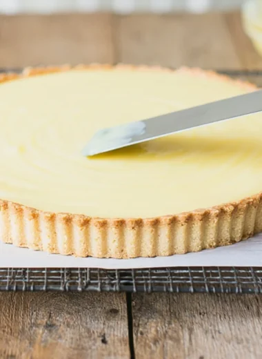 Delicious lemon tart with a golden crust and creamy lemon filling