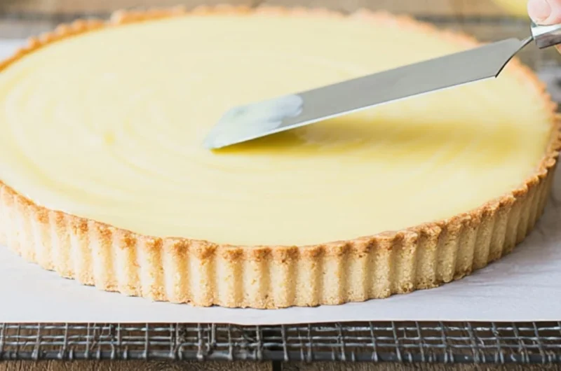 Delicious lemon tart with a golden crust and creamy lemon filling