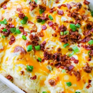 Creamy Million Dollar Chicken Bake topped with jalapenos and ranch dressing