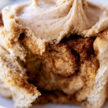 Delicious pumpkin butter cinnamon rolls topped with cream cheese icing