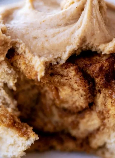 Delicious pumpkin butter cinnamon rolls topped with cream cheese icing