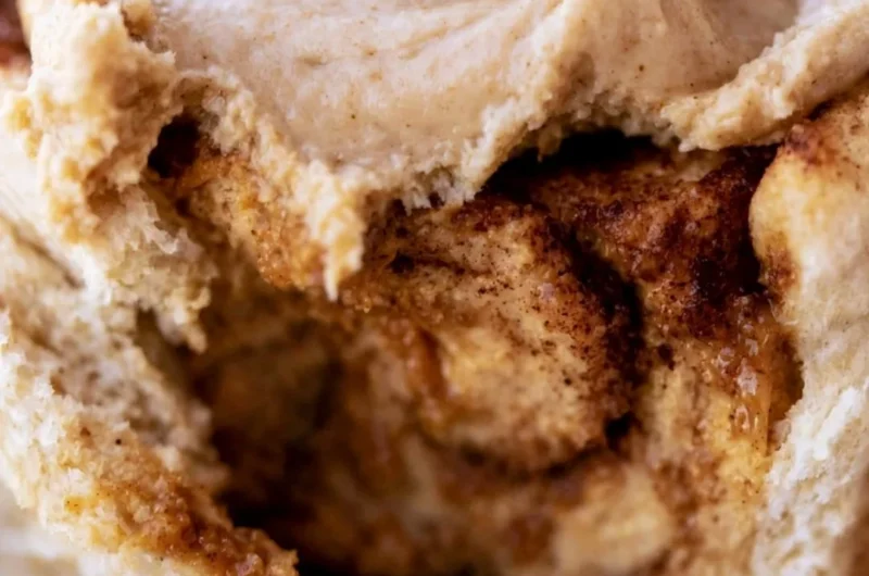 Delicious pumpkin butter cinnamon rolls topped with cream cheese icing