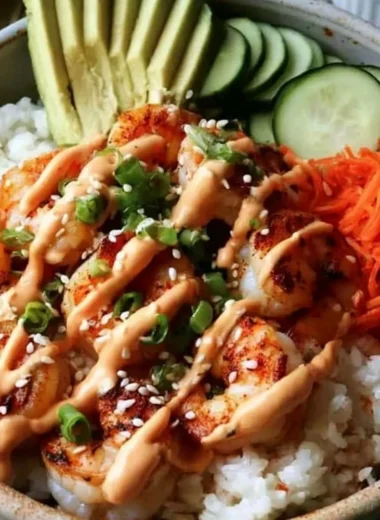 Shrimp rice bowl with spicy mayo served in a bowl.