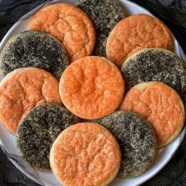 Halloween sugar cookies decorated with spooky designs and vibrant colors.