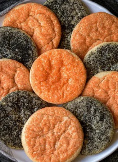Halloween sugar cookies decorated with spooky designs and vibrant colors.