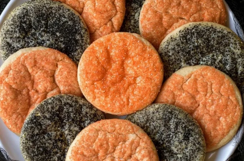 Halloween sugar cookies decorated with spooky designs and vibrant colors.