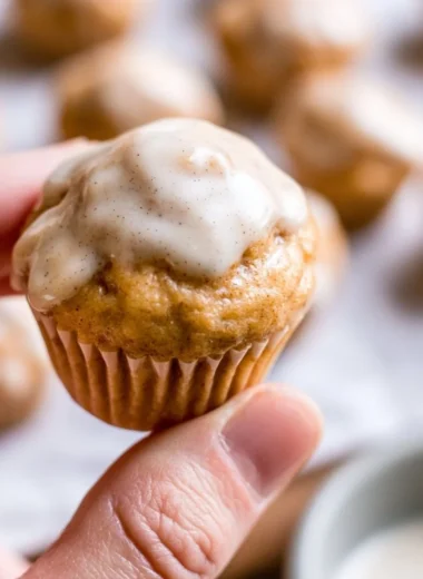 Mini chai muffins topped with a vanilla bean glaze, freshly baked and delicious