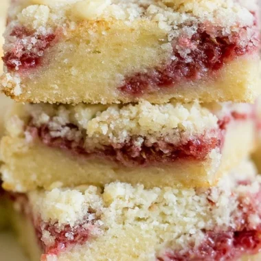 Raspberry Almond Crumb Bars with a crumbly topping and fresh raspberries.