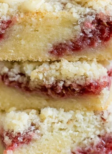 Raspberry Almond Crumb Bars with a crumbly topping and fresh raspberries.