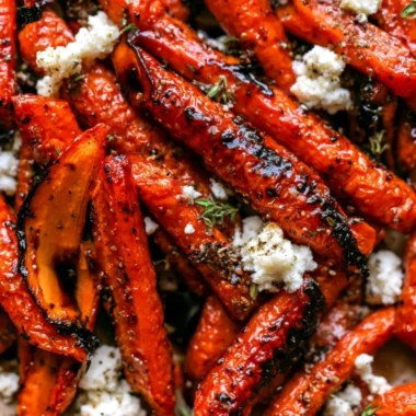Honey balsamic roasted carrots garnished and ready to serve as a delicious side dish.