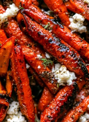 Honey balsamic roasted carrots garnished and ready to serve as a delicious side dish.